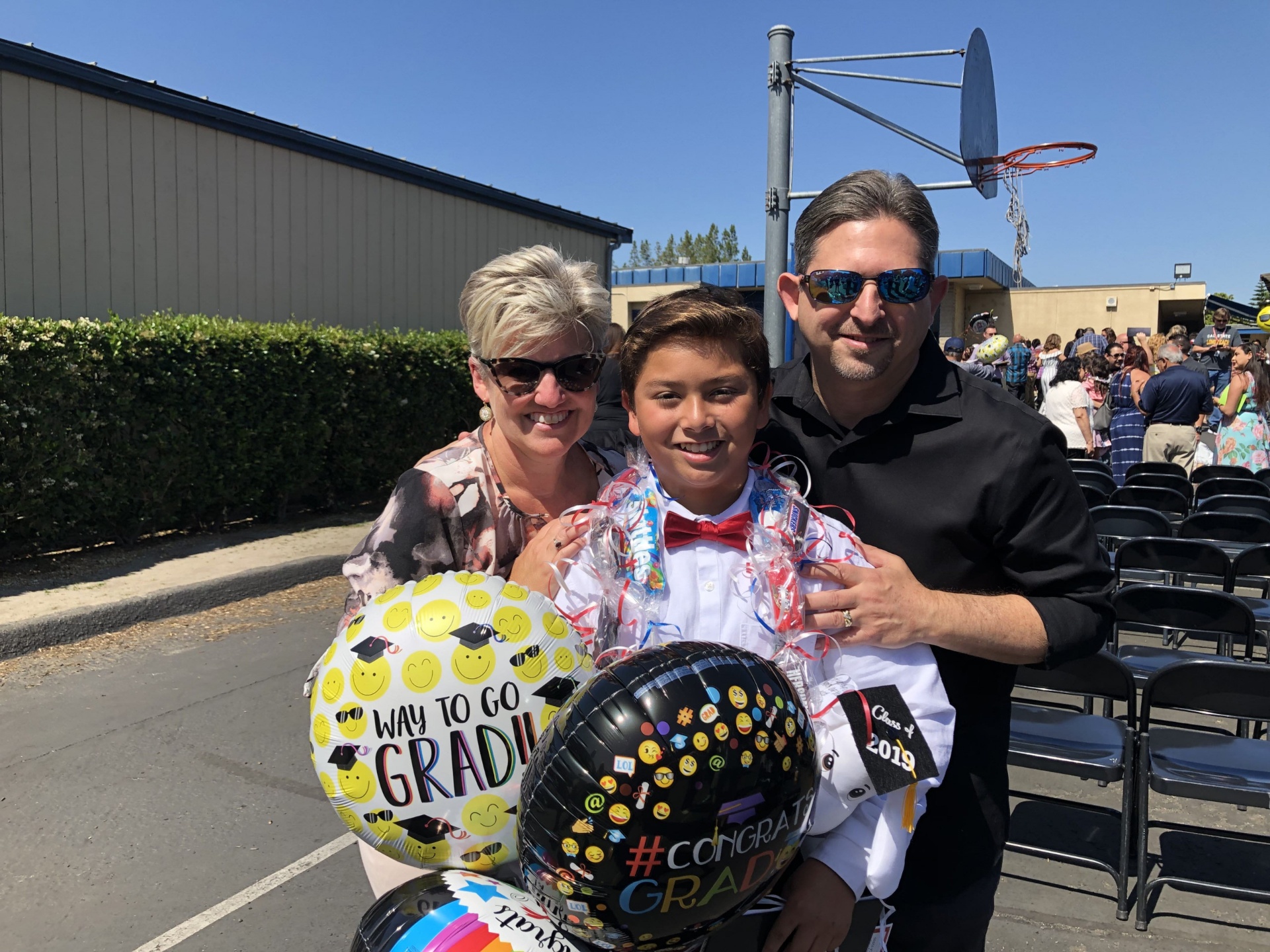 Darren Dunner with family at a graduation celebration